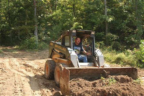 pond building with skid steer|2.5 acre skid steer loader.